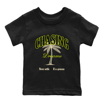 Chasing Dreams baby and kids t-shirt crafted for little sneakerheads to shine with the Jordan Jumpman Jack Travis Scott Bright Cactus sneakers, displayed in Black 2.