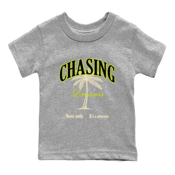 Chasing Dreams baby and kids t-shirt crafted for little sneakerheads to shine with the Jordan Jumpman Jack Travis Scott Bright Cactus sneakers, displayed in Heather Grey 2.