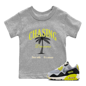 Chasing Dreams baby and kids t-shirt crafted for little sneakerheads to shine with the Air Max 90 Cyber sneakers, displayed in Heather Grey 1.