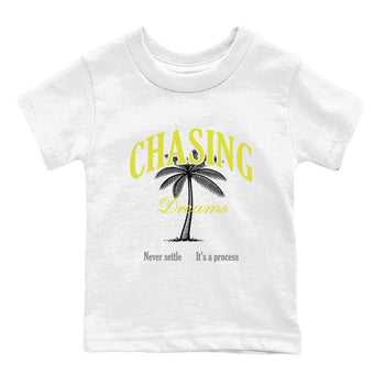 Chasing Dreams baby and kids t-shirt crafted for little sneakerheads to shine with the Air Max 90 Cyber sneakers, displayed in White 2.