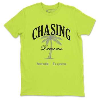 Chasing Dreams sneaker match t-shirt styled to complete your fit with the Air Max 90 Cyber sneakers, shown in Safety Green 2.