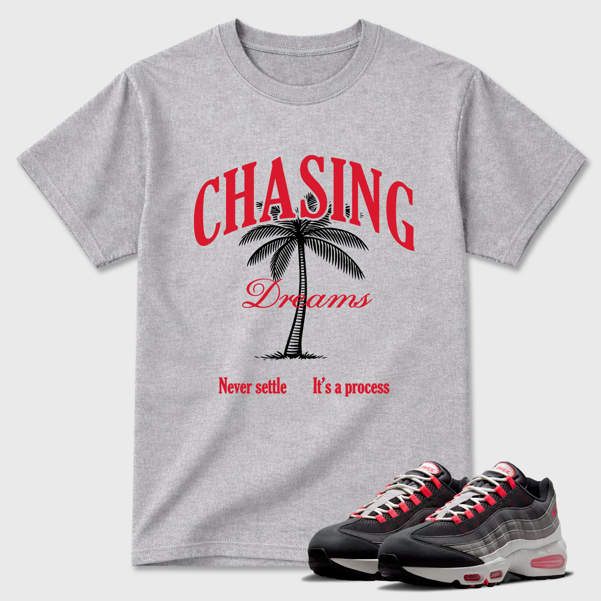 Chasing Dreams Graphic T-Shirt featuring original streetwear artwork designed to match the Air Max 95 Reverse Solar Red. Heather Grey 1 Graphic T-Shirt.