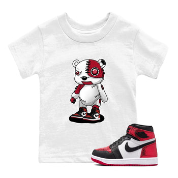 Cyborg Bear baby and kids t-shirt crafted for little sneakerheads to shine with the Air Jordan 1 Ruby sneakers, displayed in White 1.