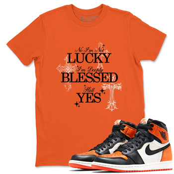 Deeply Blessed sneaker match t-shirt styled to complete your fit with the Air Jordan 1 Shattered Backboard sneakers, shown in Orange 2.