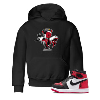Devil Angel baby and kids t-shirt crafted for little sneakerheads to shine with the Air Jordan 1 Ruby sneakers, displayed in Black 1.