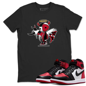 Devil Angel sneaker match t-shirt styled to complete your fit with the Air Jordan 1 Ruby sneakers, shown in Black 1.