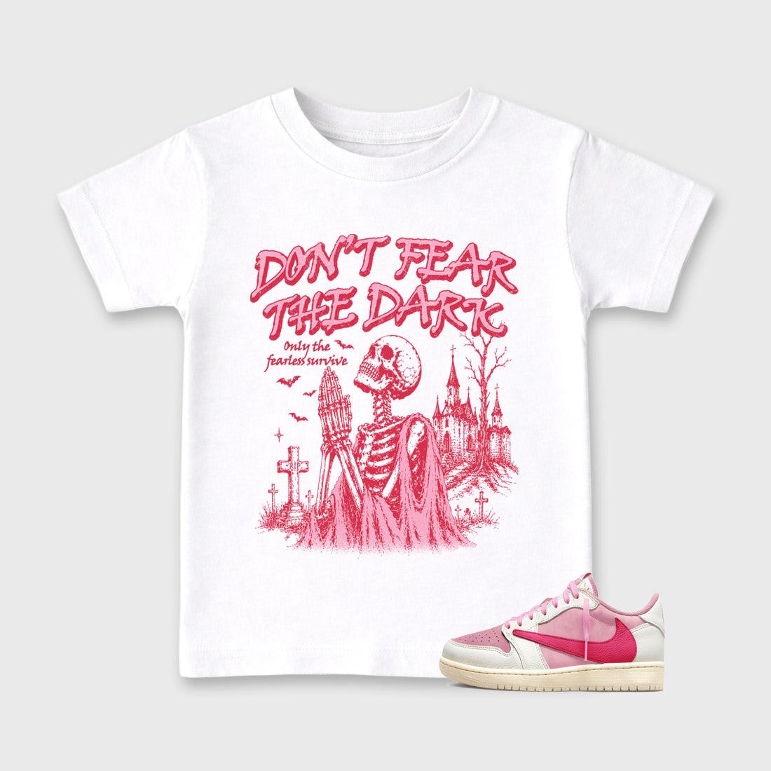 Don't Fear the Dark Baby & Kids Graphic T-Shirt featuring original artwork designed to match the Air Jordan 1 Travis Scott Tropical Pink. White 1 Kids Graphic Tee.
