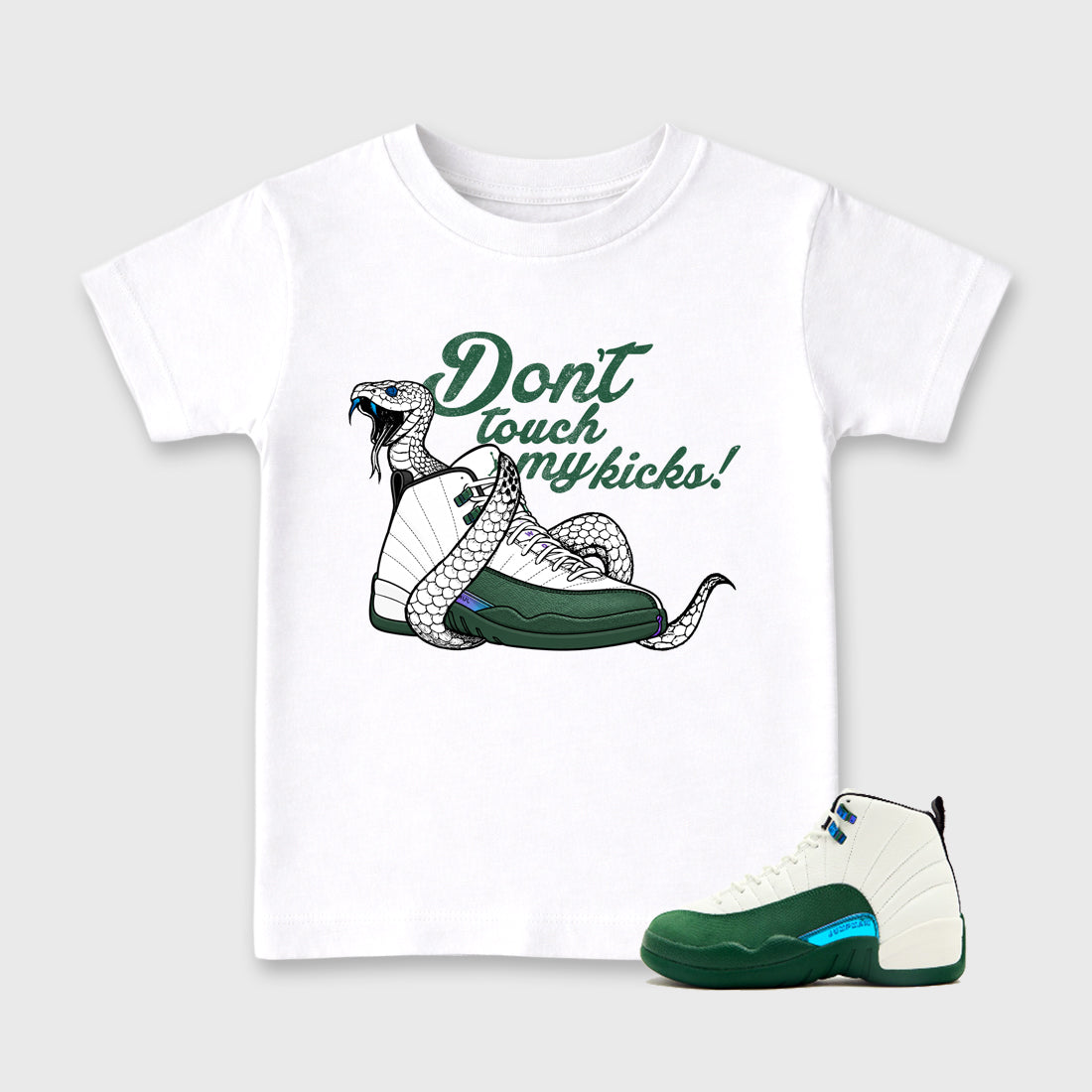 Don't Touch My Kicks Baby & Kids Graphic T-Shirt featuring original artwork designed to match the Air Jordan 12 Summit Green. White 1 Kids Graphic Tee.