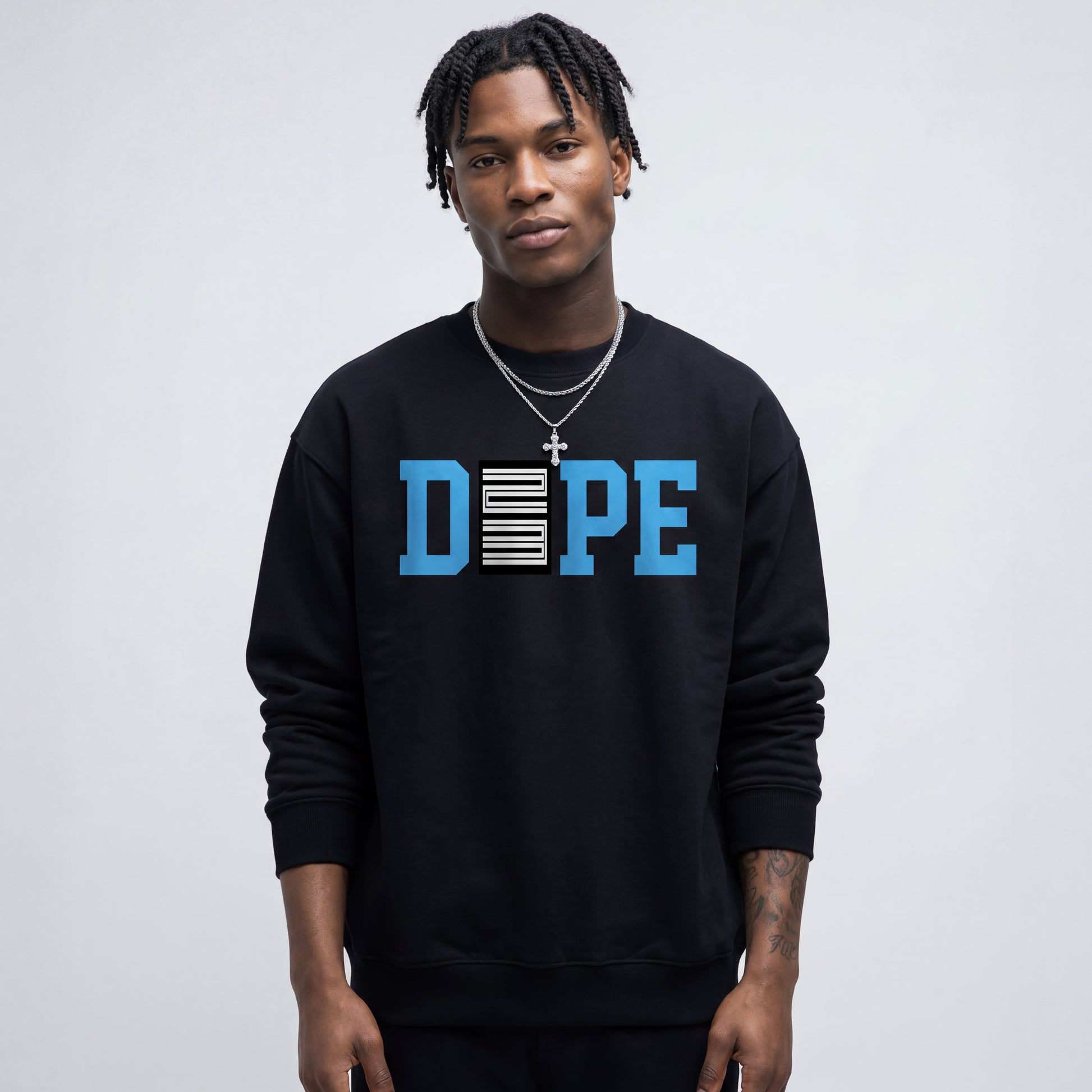 Person wearing a black sweatshirt with 'DOPE' printed in blue and white on a light gray background