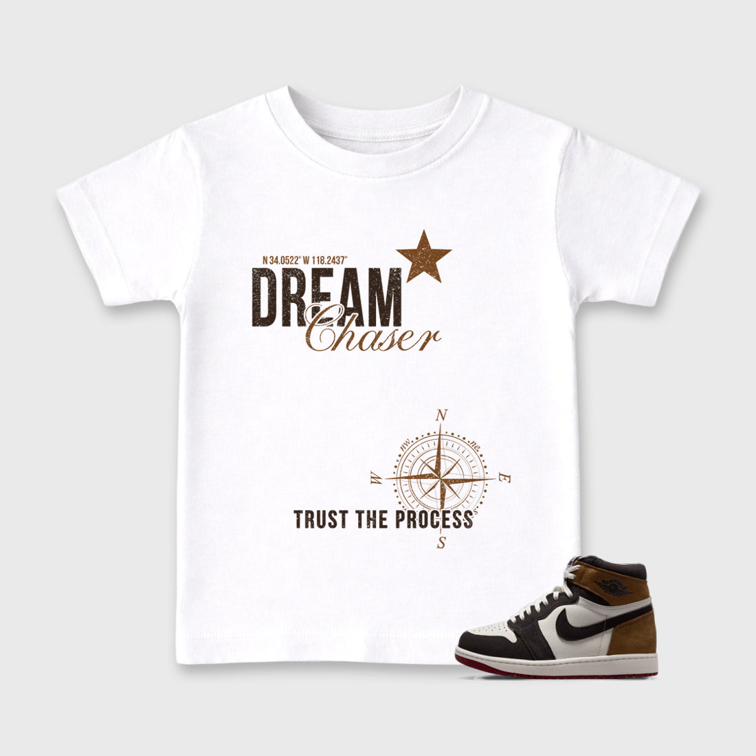 Dream Chaser Baby & Kids Graphic T-Shirt featuring original artwork designed to match the Air Jordan 1 Love Letter. White 1 Kids Graphic Tee.