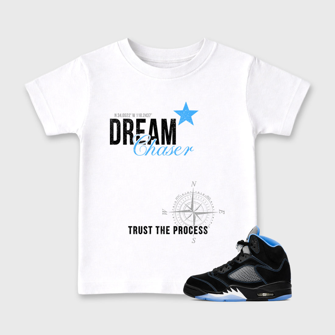 Dream Chaser affordable baby and kids t-shirt designed to match the Air Jordan 5 Black University Blue, featuring coordinated White 1 options for the perfect little sneakerhead streetwear look.