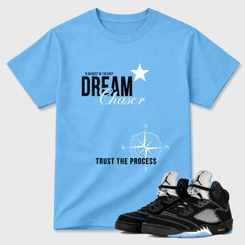 Dream Chaser Graphic T-Shirt sneaker match tee designed for the Air Jordan 5 Black University Blue, featuring coordinated color options for a perfect streetwear match. Carolina Blue 1 shirt.