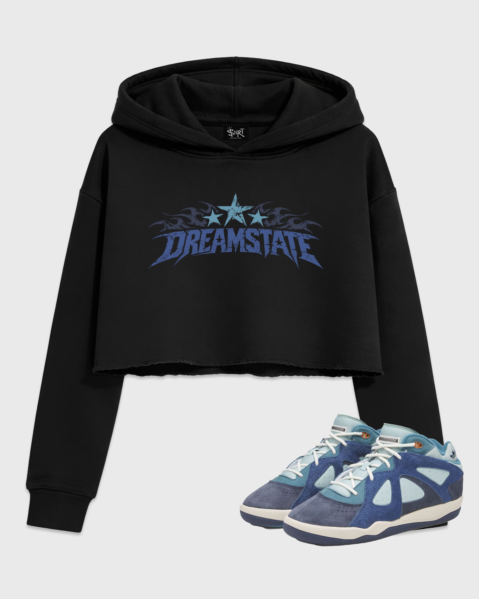 Dream State Women’s Graphic Crop Tee featuring original streetwear artwork designed to match the Bad Bunny x Badbo 1.0 Night Navy. Black 1 Crop Tee.