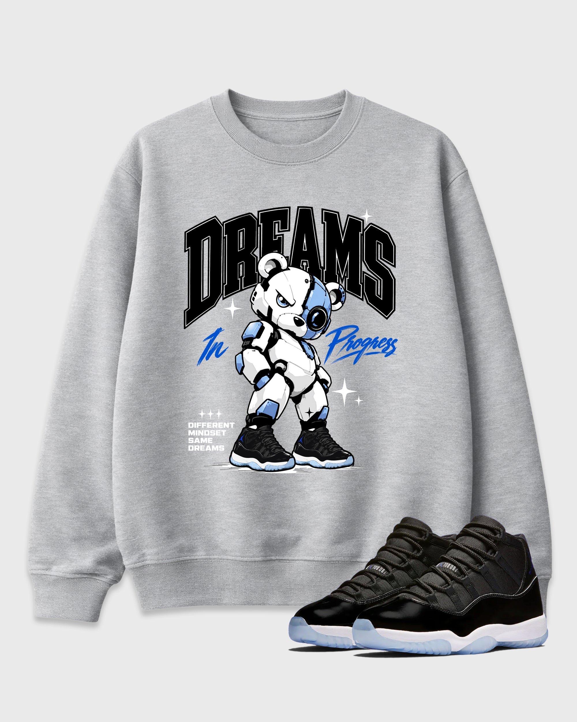 Dreams In Progress Graphic T-Shirt featuring original streetwear artwork designed to match the Air Jordan 11 Space Jam. Heather Grey 1 Graphic Tee.