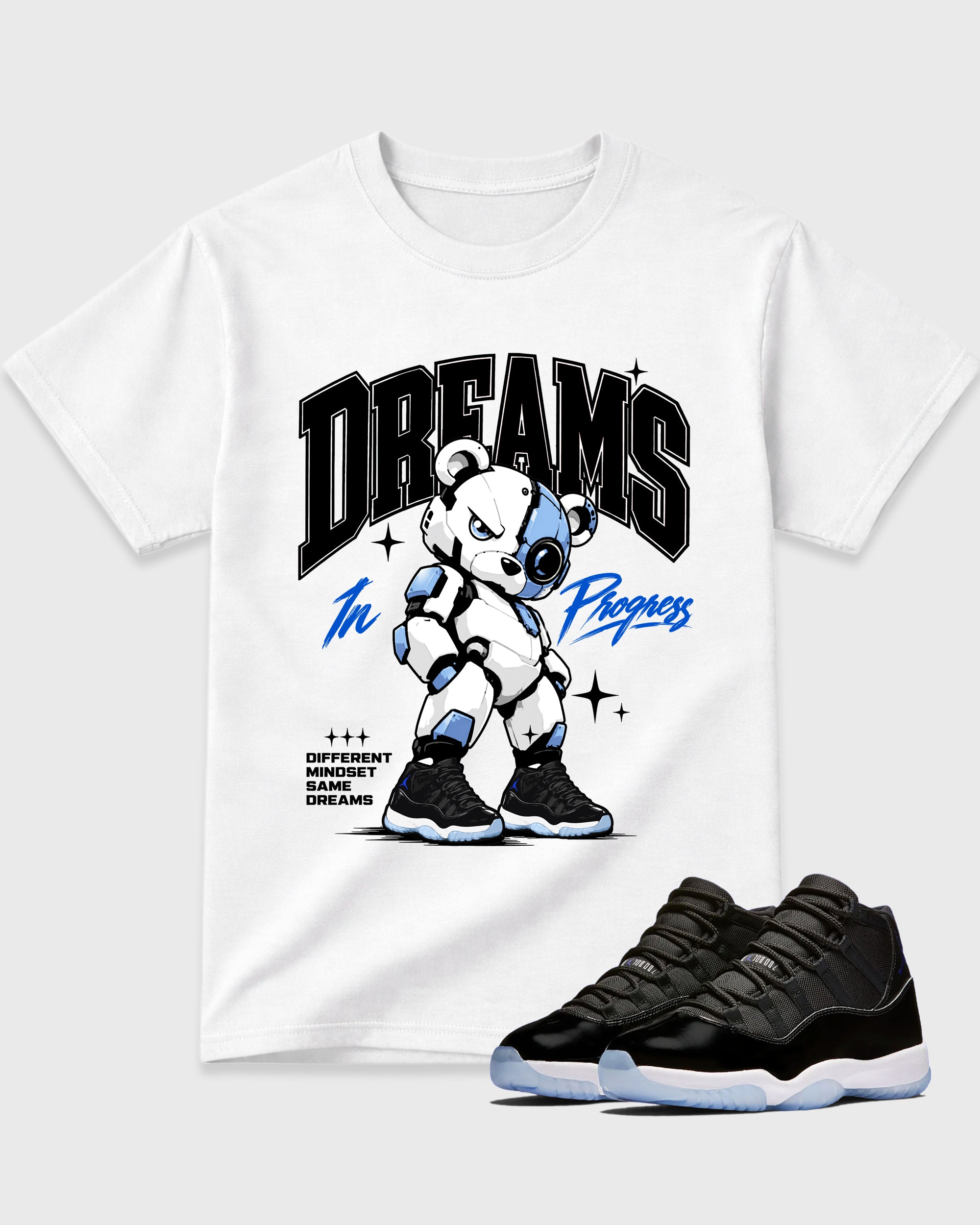 Dreams In Progress Graphic T-Shirt featuring original streetwear artwork designed to match the Air Jordan 11 Space Jam. White 1 Graphic T-Shirt.