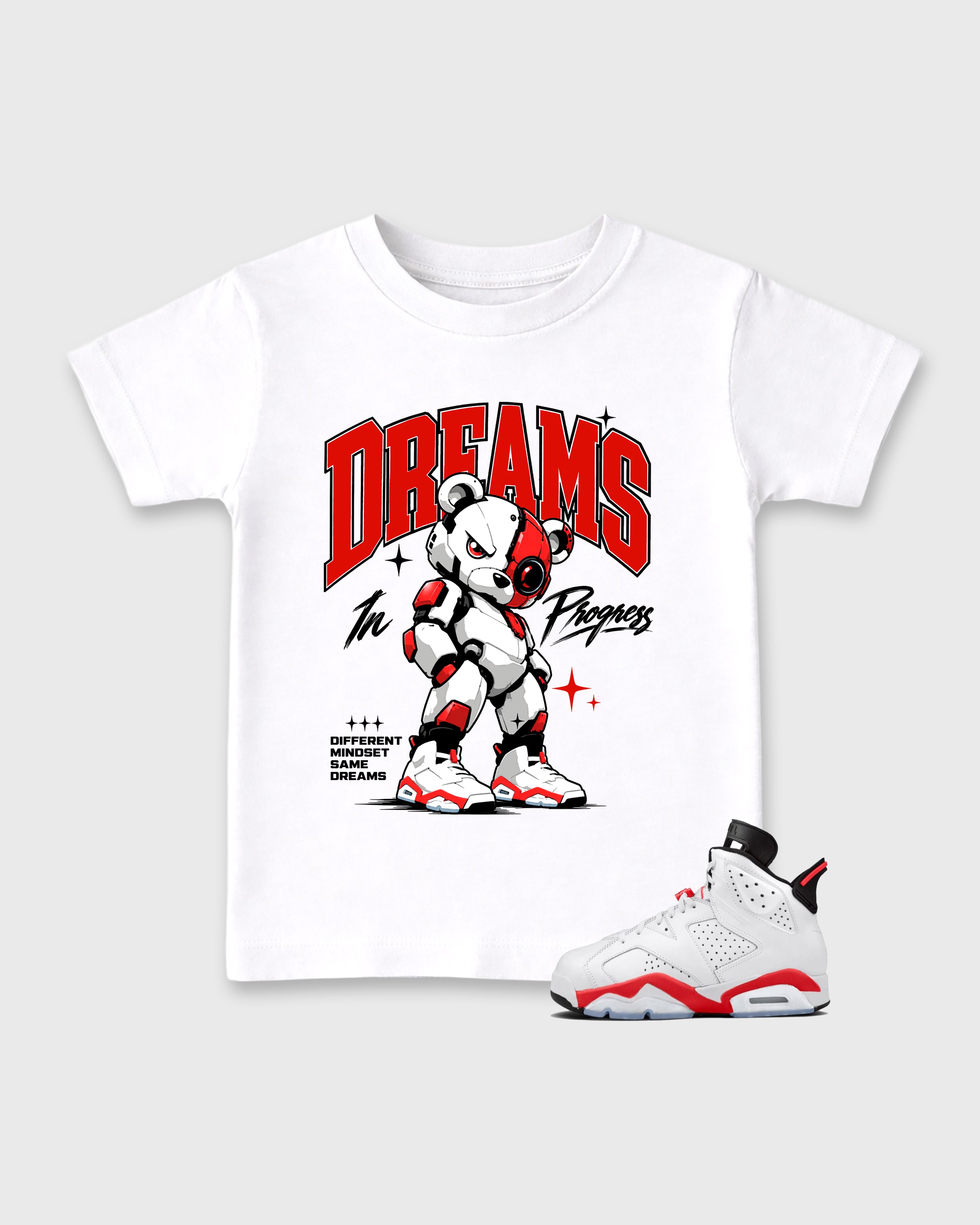 Dreams In Progress Baby & Kids Graphic T-Shirt featuring original artwork designed to match the Air Jordan 6 White Infrared. White 1 Kids Graphic Tee.