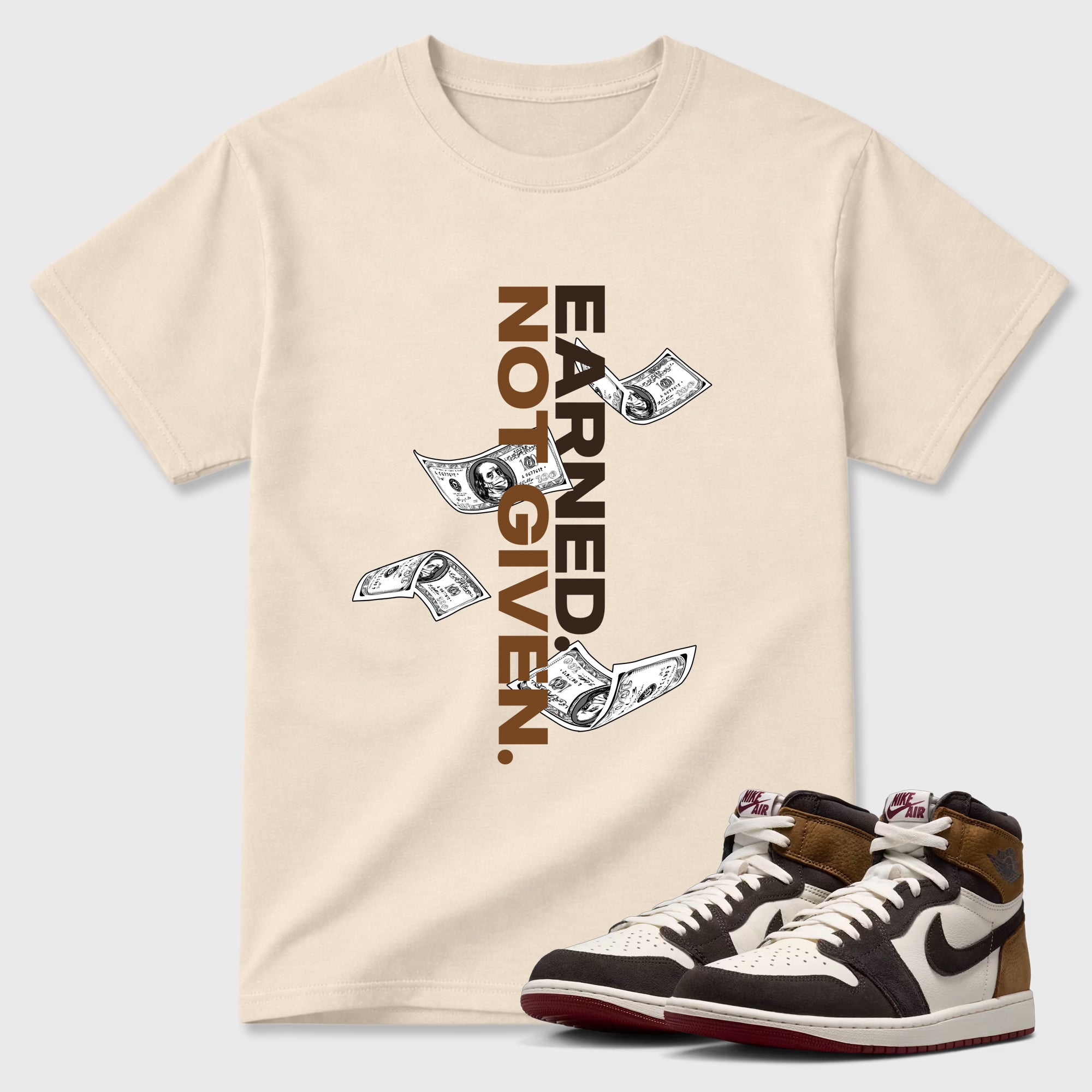 Earned Not Given Graphic T-Shirt featuring original streetwear artwork designed to match the Air Jordan 1 Love Letter. Natural 1 Graphic T-Shirt.