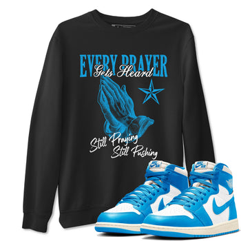 Every Prayer Gets Heard sneaker match t-shirt styled to complete your fit with the Air Jordan 1 UNC Reimagined sneakers, shown in Black 1.