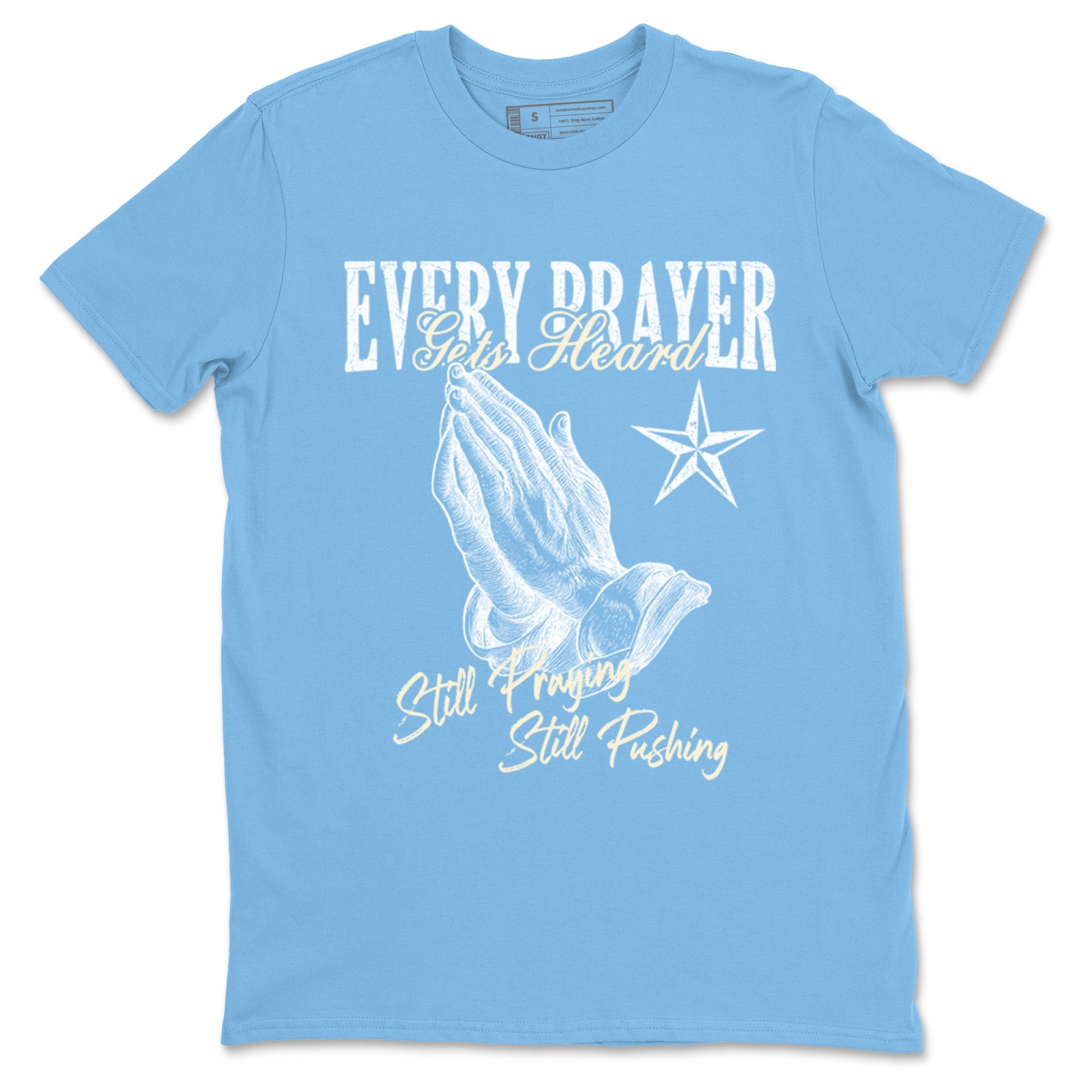 Every Prayer Gets Heard sneaker match t-shirt styled to complete your fit with the Air Jordan 1 UNC Reimagined sneakers, shown in Carolina Blue 2.