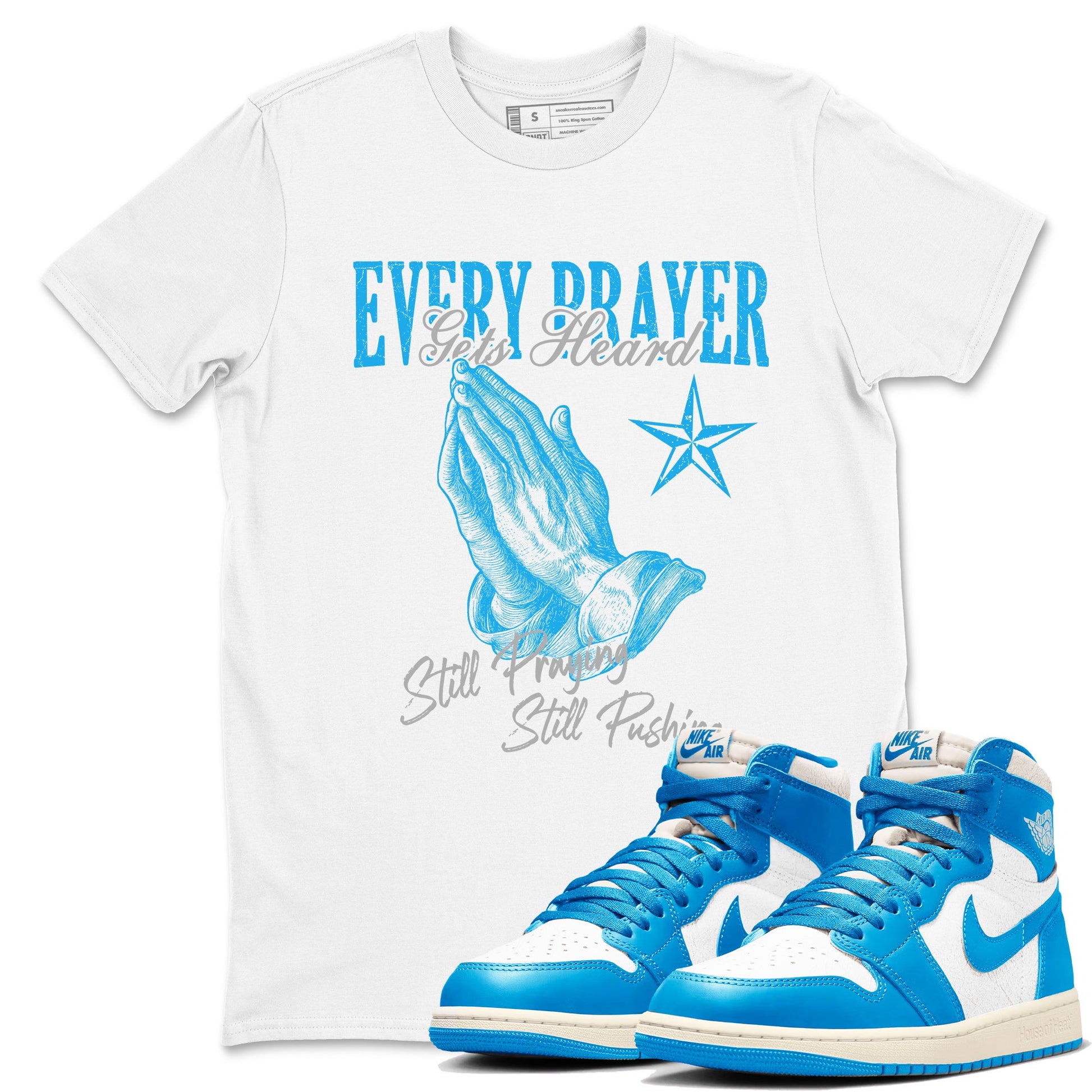 Every Prayer Gets Heard sneaker match t-shirt styled to complete your fit with the Air Jordan 1 UNC Reimagined sneakers, shown in White 1.