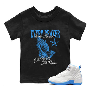 Every Prayer Gets Heard baby and kids t-shirt crafted for little sneakerheads to shine with the Air Jordan 12 White and University Blue sneakers, displayed in Black 1.