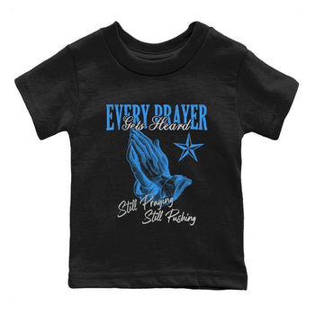Every Prayer Gets Heard baby and kids t-shirt crafted for little sneakerheads to shine with the Air Jordan 12 White and University Blue sneakers, displayed in Black 2.