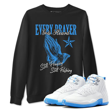 Every Prayer Gets Heard sneaker match t-shirt styled to complete your fit with the Air Jordan 12 White and University Blue sneakers, shown in Black 1.