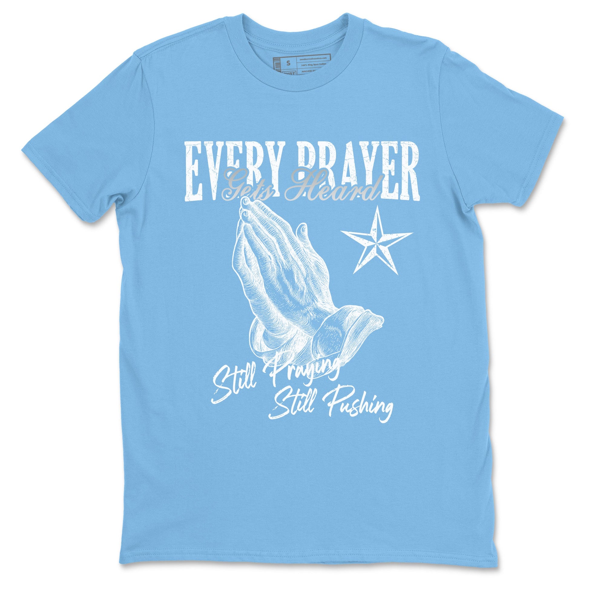 Every Prayer Gets Heard sneaker match t-shirt styled to complete your fit with the Air Jordan 12 White and University Blue sneakers, shown in Carolina Blue 2.