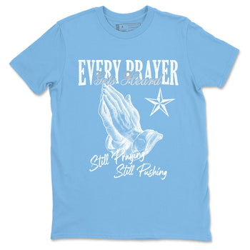 Every Prayer Gets Heard sneaker match t-shirt styled to complete your fit with the Air Jordan 12 White and University Blue sneakers, shown in Carolina Blue 2.