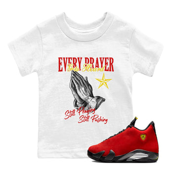 Every Prayer Gets Heard baby and kids t-shirt crafted for little sneakerheads to shine with the Air Jordan 14 Challenge Red sneakers, AJ14 Ferrari,  displayed in White 1.