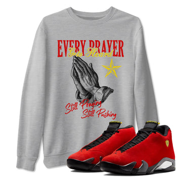 Every Prayer Gets Heard sneaker match t-shirt styled to complete your fit with the Air Jordan 14 Challenge Red sneakers, AJ14 Ferrari,  shown in Heather Grey 1.