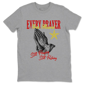 Every Prayer Gets Heard sneaker match t-shirt styled to complete your fit with the Air Jordan 14 Challenge Red sneakers, AJ14 Ferrari,  shown in Heather Grey 2.