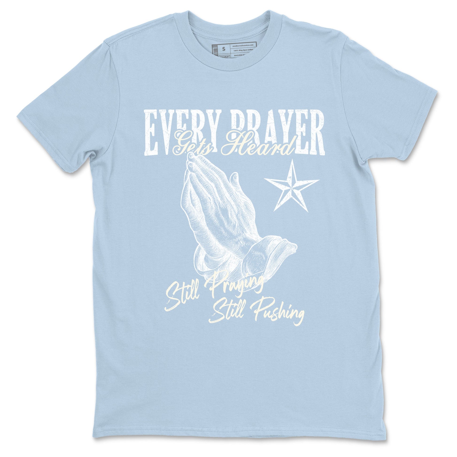 Every Prayer Gets Heard sneaker match t-shirt styled to complete your fit with the Air Jordan 4 Aluminum sneakers, shown in Light Blue 2.