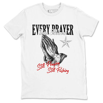 Every Prayer Gets Heard sneaker match t-shirt styled to complete your fit with the Air Jordan 4 White Cement sneakers, shown in White 2.