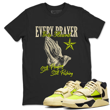 Every Prayer Gets Heard sneaker match t-shirt styled to complete your fit with the Jordan Jumpman Jack Travis Scott Bright Cactus sneakers, shown in Black 1.