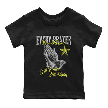 Every Prayer Gets Heard baby and kids t-shirt crafted for little sneakerheads to shine with the Air Max 90 Cyber sneakers, displayed in Black 2.