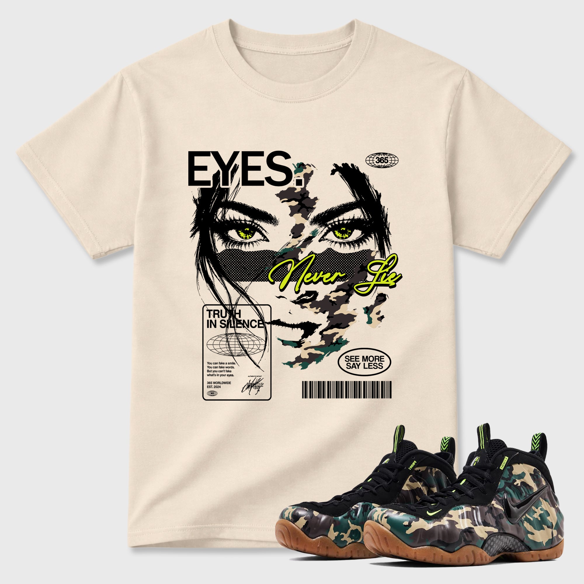 Eyes Never Lie Graphic T-Shirt featuring original streetwear artwork designed to match the Air Foamposite Pro Green Camo. Natural 1 Graphic T-Shirt.