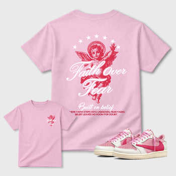 Faith Over Fear Graphic T-Shirt sneaker match tee designed for the Air Jordan 1 Travis Scott Tropical Pink sneakers, featuring coordinated color options for a perfect streetwear match. Pink shirt.