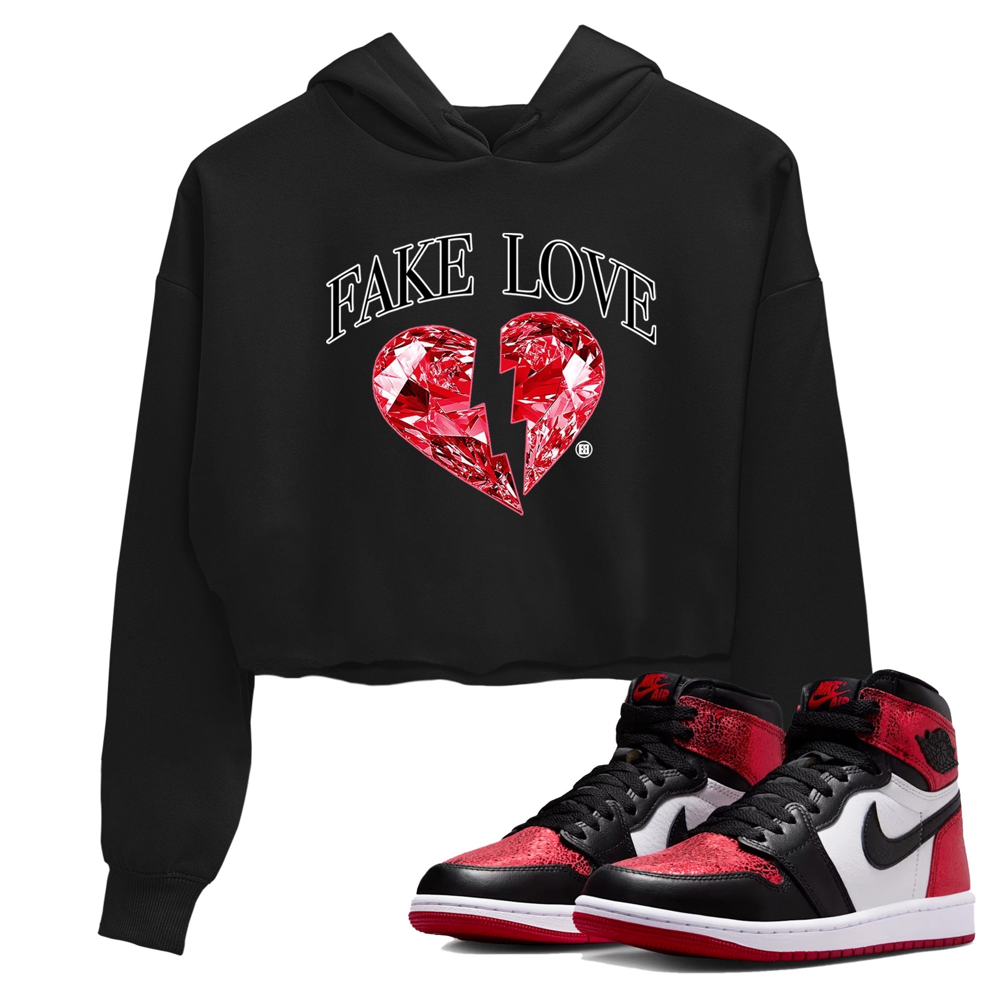 Fake Love womens crop tee made to vibe with the Air Jordan 1 Ruby sneakers — the perfect match in Black 1.