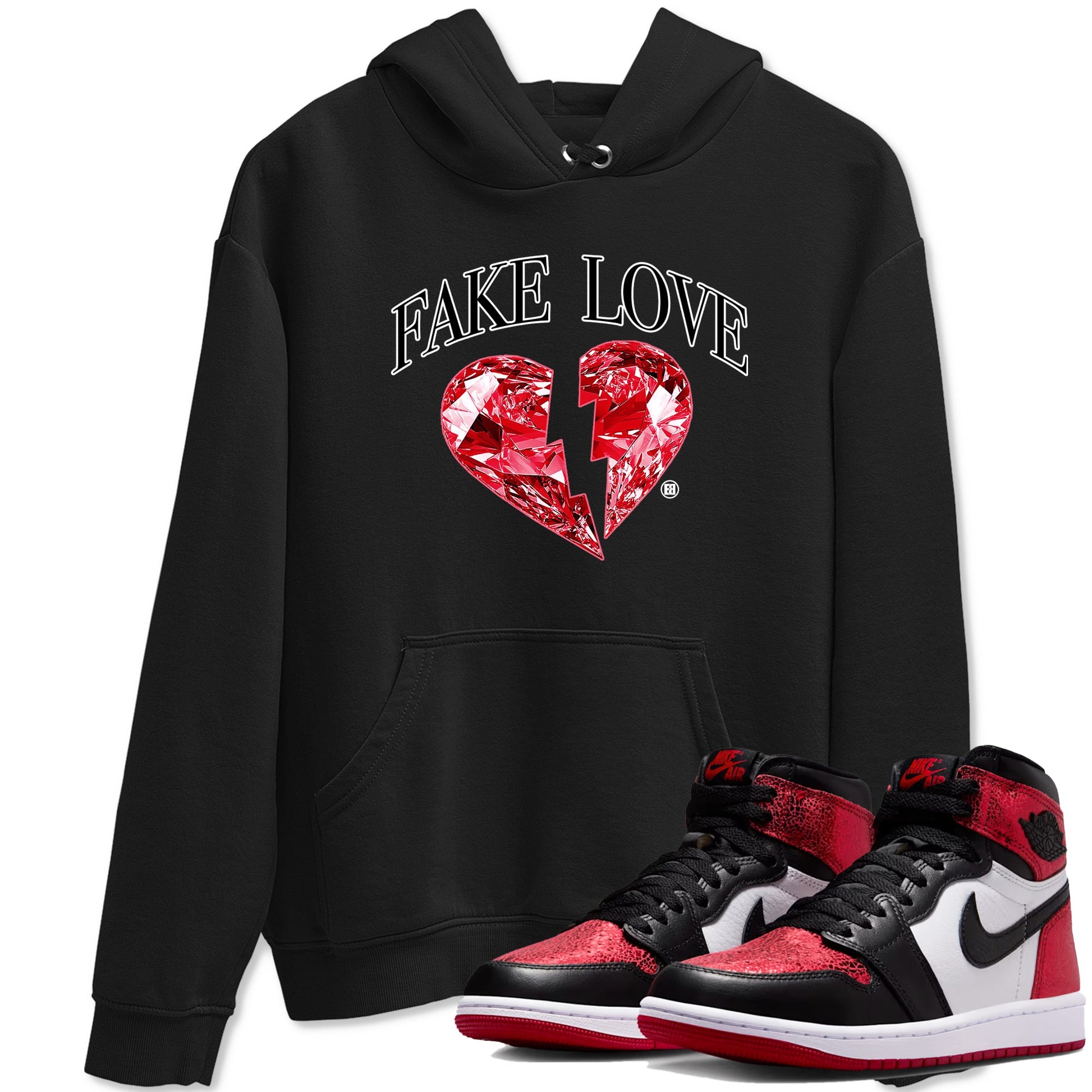 Fake Love sneaker match t-shirt styled to complete your fit with the Air Jordan 1 Ruby sneakers, shown in Black 1.