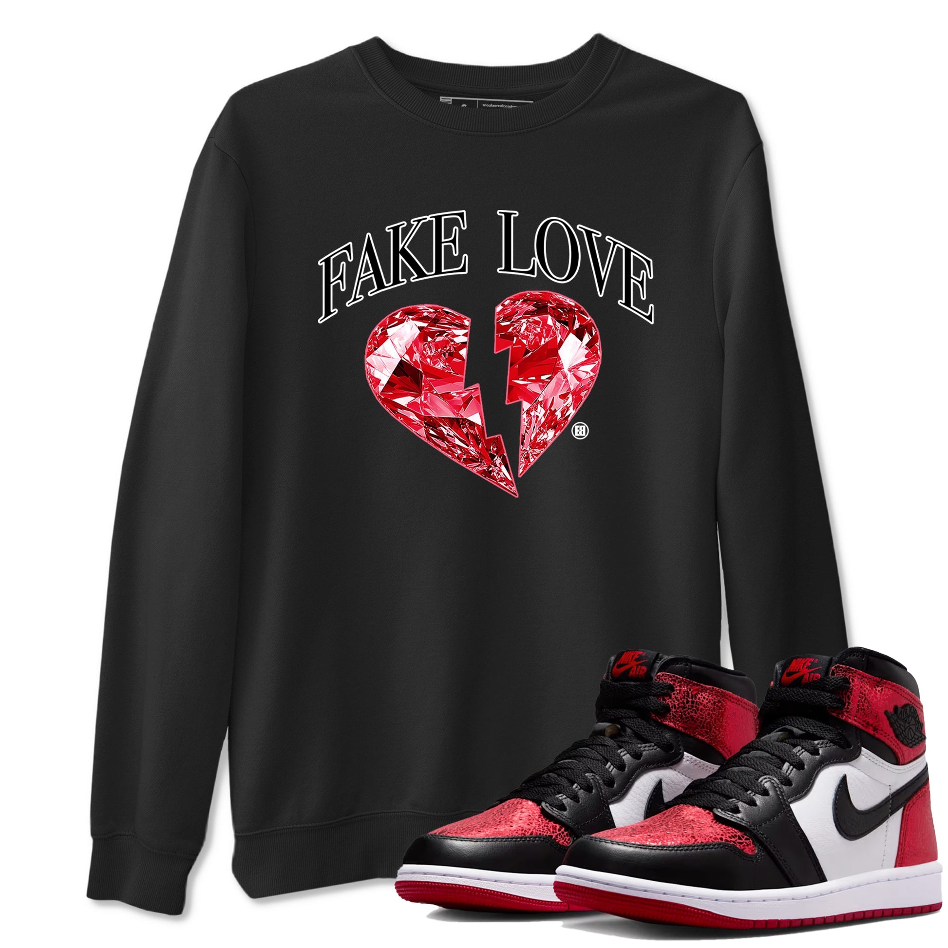 Fake Love sneaker match t-shirt styled to complete your fit with the Air Jordan 1 Ruby sneakers, shown in Black 1.