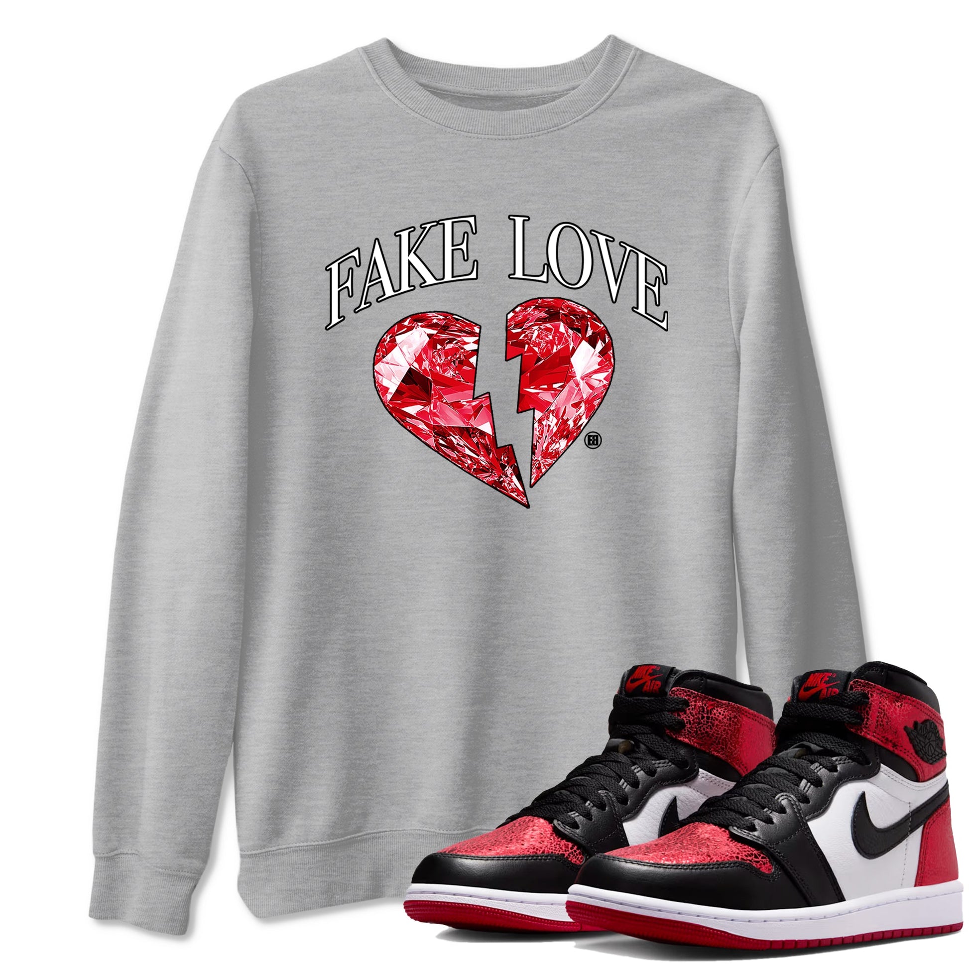Fake Love sneaker match t-shirt styled to complete your fit with the Air Jordan 1 Ruby sneakers, shown in Heather Grey 1.