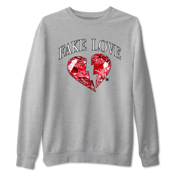 Fake Love sneaker match t-shirt styled to complete your fit with the Air Jordan 1 Ruby sneakers, shown in Heather Grey 2.