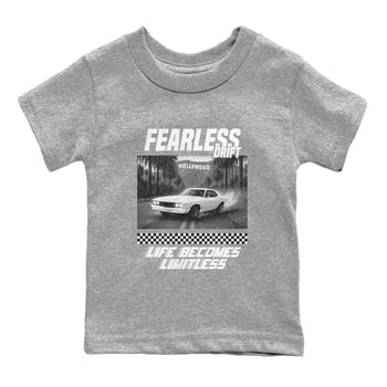 Fearless Drift baby and kids t-shirt crafted for little sneakerheads to shine with the Air Foamposite One Triple White sneakers, displayed in Heather Grey 2.