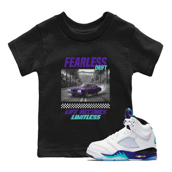 Fearless Drift baby and kids t-shirt crafted for little sneakerheads to shine with the Air Jordan 5 Grape sneakers, displayed in Black 1.