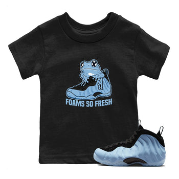 Foams So Fresh baby and kids t-shirt crafted for little sneakerheads to shine with the Air Foamposite One Psychic Blue sneakers, displayed in Black 1.