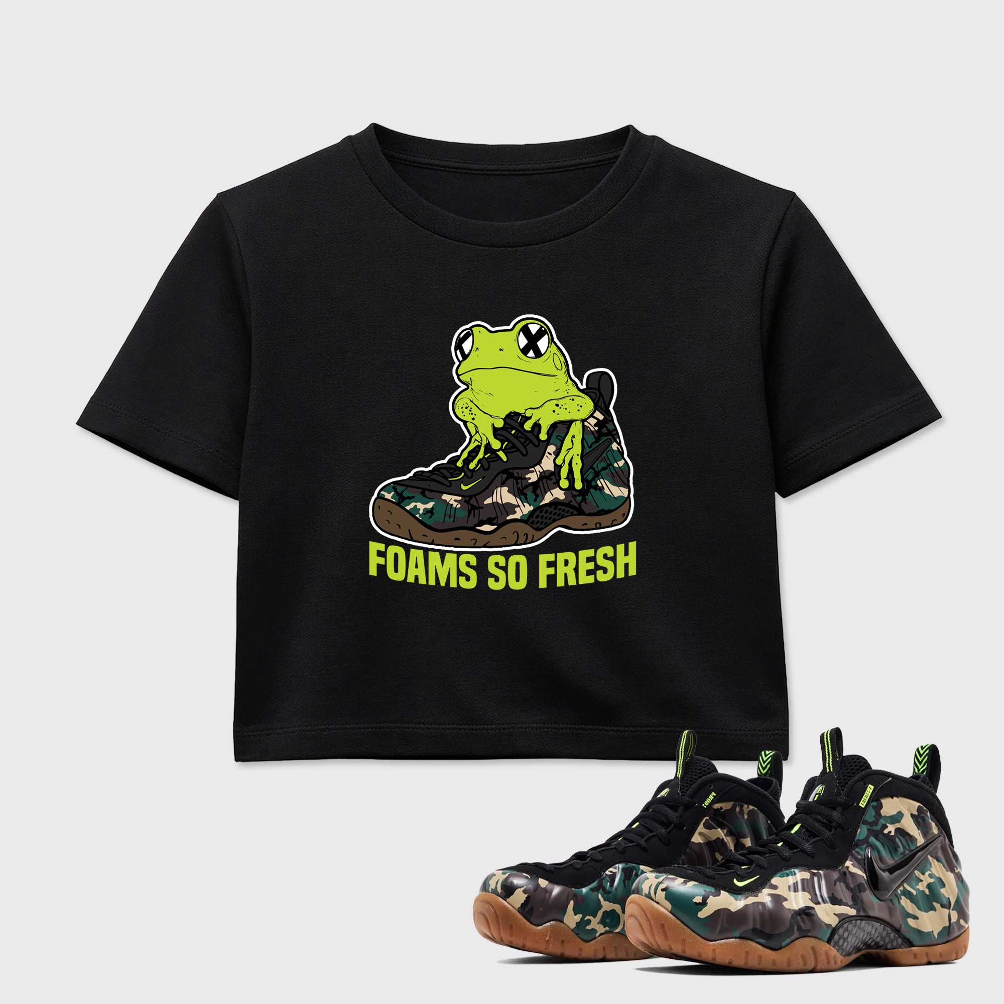 Foams So Fresh women’s crop tee designed to match the Air Foamposite Pro Green Camo, featuring coordinated Black 1 options for a perfect streetwear vibe.