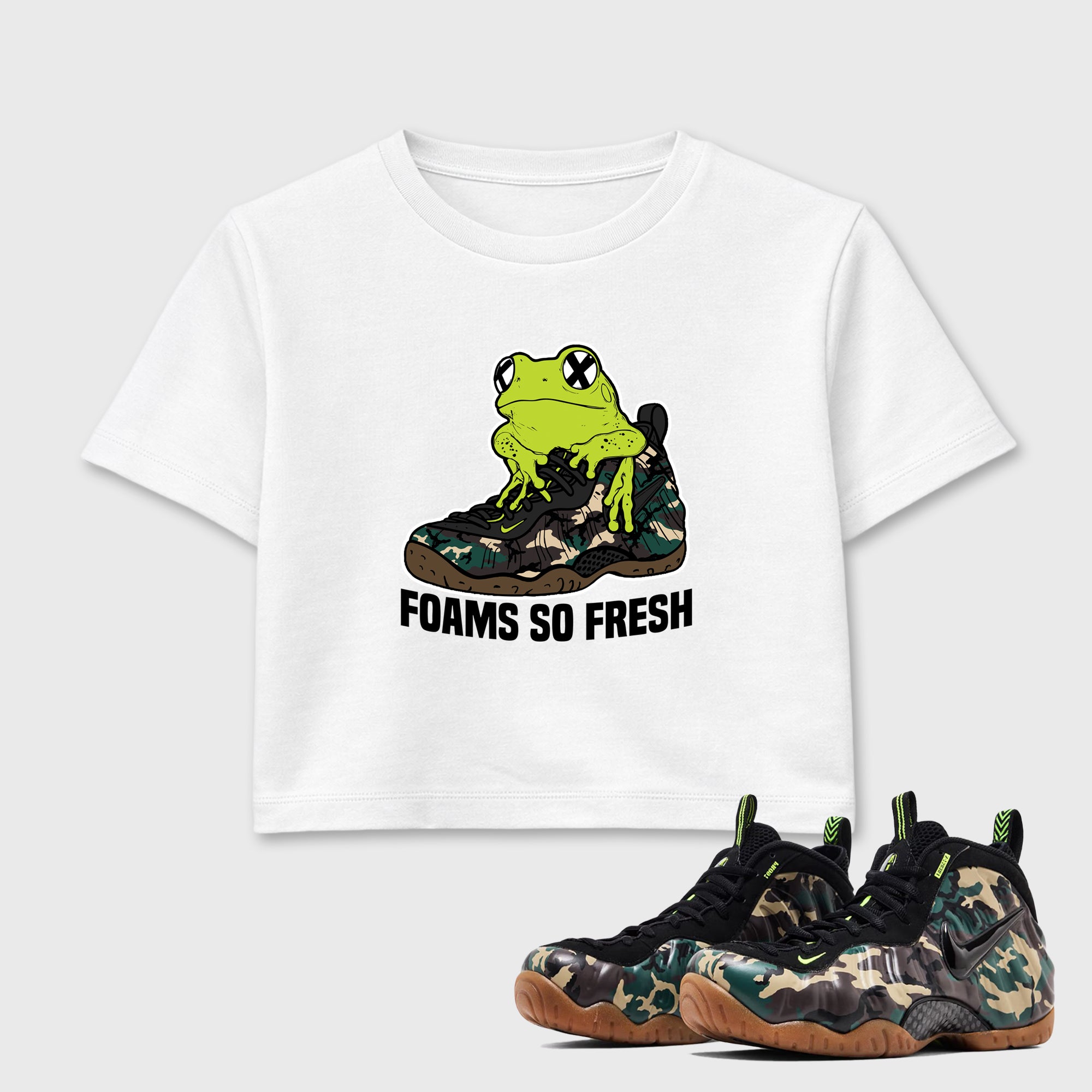 Foams So Fresh women’s crop tee designed to match the Air Foamposite Pro Green Camo, featuring coordinated White 1 options for a perfect streetwear vibe.
