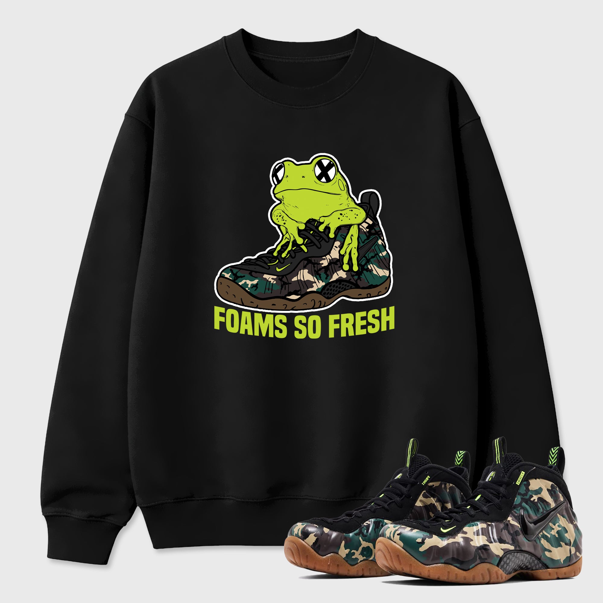 Foams So Fresh Graphic T-Shirt featuring original streetwear artwork designed to match the Air Foamposite Pro Green Camo. Black 1 Graphic Tee.