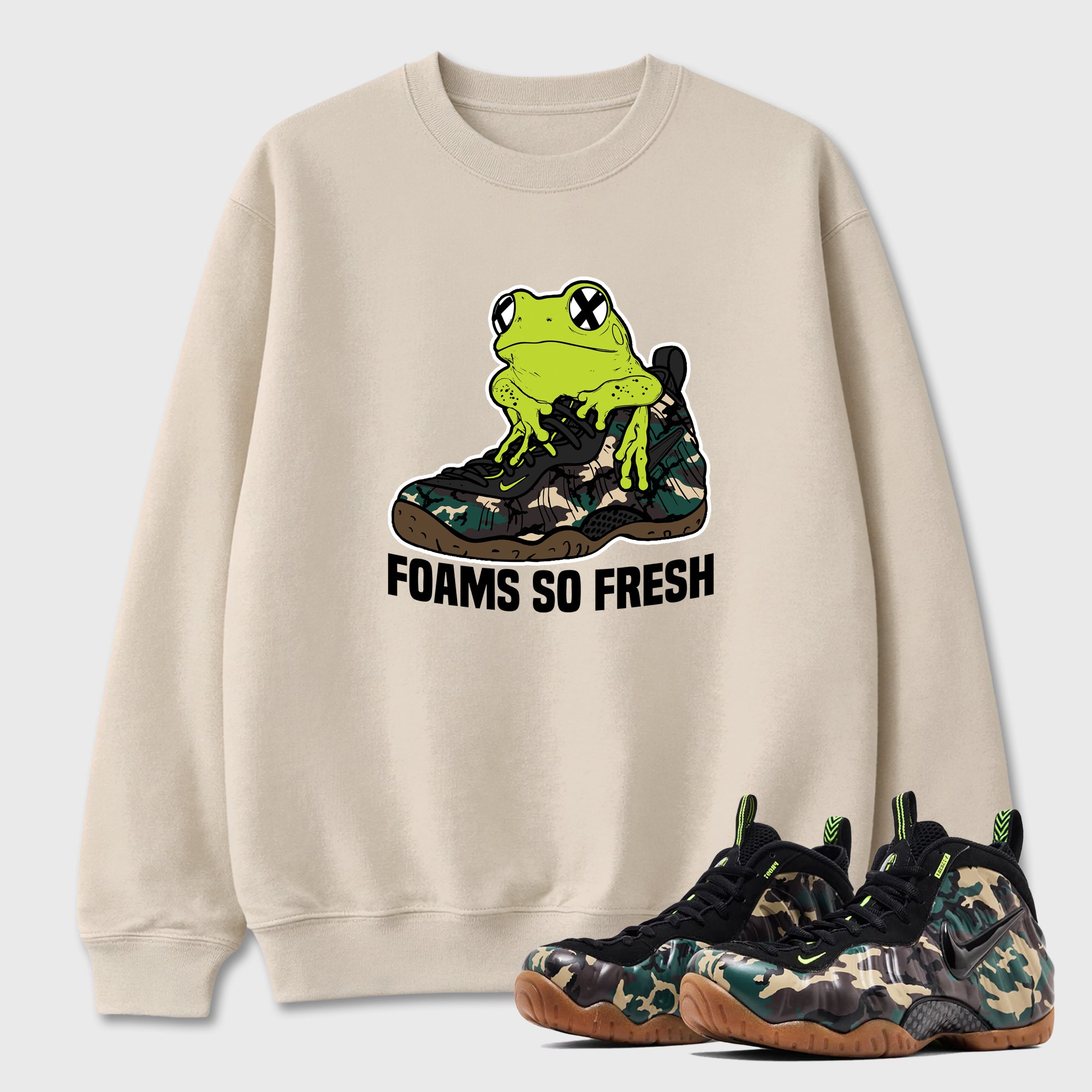 Foams So Fresh Graphic T-Shirt featuring original streetwear artwork designed to match the Air Foamposite Pro Green Camo. Natural 1 Graphic Tee.